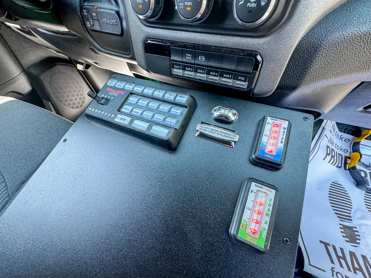 Upper side rail and compartment-top close-up along the body edge.